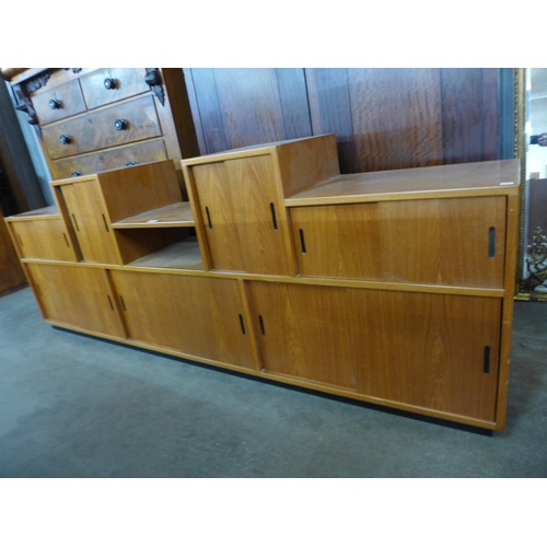 125 - A teak bookcase/record cabinet