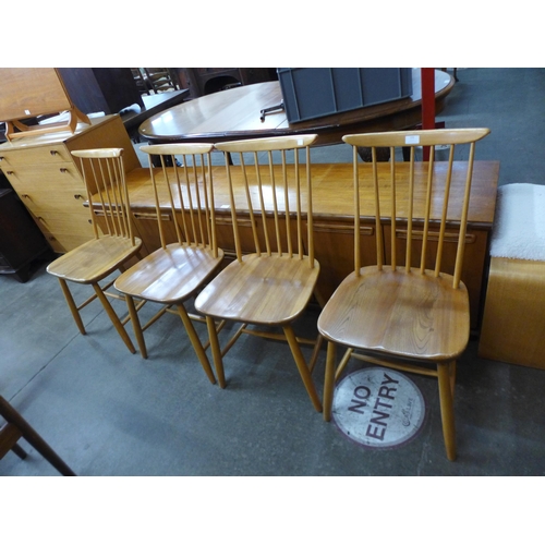 133 - A set of four Ercol style elm and beech kitchen chairs