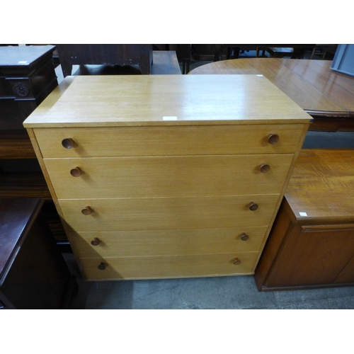 135 - An Avalon teak chest of drawers