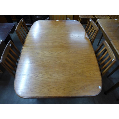 138 - A G-Plan Fresco teak extending dining table and six chairs