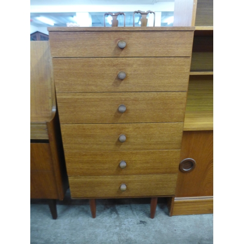 149 - A teak chest of drawers