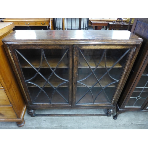 158 - An early 20th Century oak two door bookcase