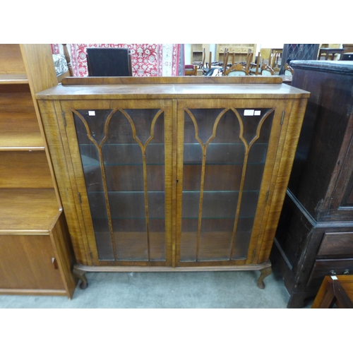 162 - A walnut display cabinet