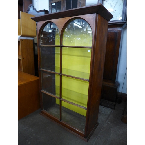 169 - A Victorian mahogany cabinet, bearing Cadbury's Chocolate inscription to door