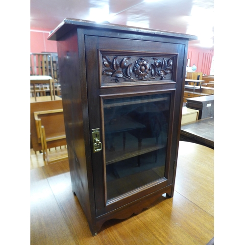 175 - An Edward VII carved beech side cabinet