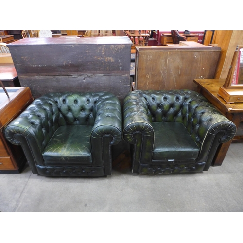 179 - A pair of green leather Chesterfield armchairs