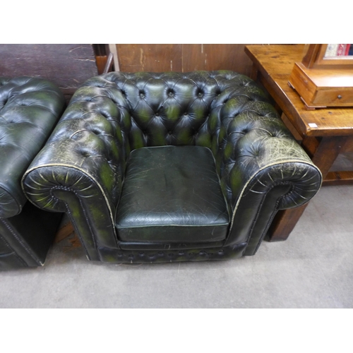 179 - A pair of green leather Chesterfield armchairs