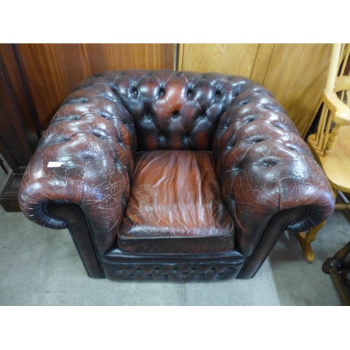 187 - A chestnut leather Chesterfield club chair