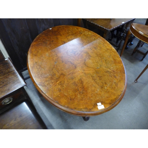 191 - A Victorian inlaid walnut oval loo table