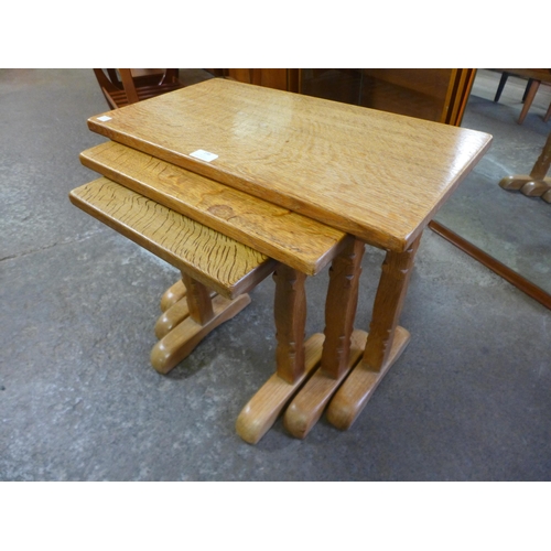 198 - A Cotswold School oak nest of tables