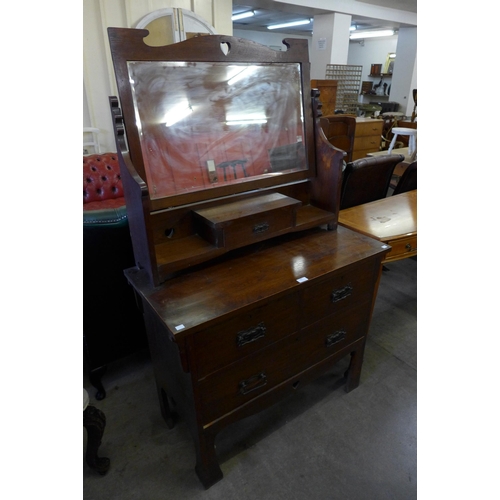 200 - An Arts and Crafts oak dressing table, attributed to Liberty & Co., London