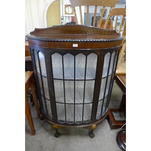 203 - A mahogany bow front display cabinet