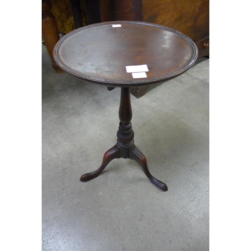 207 - An Edward VII mahogany tripod wine table