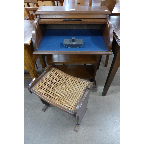 211 - A small oak tambour roll-top desk and a stool