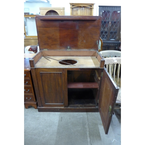 220 - A Victorian mahogany washstand