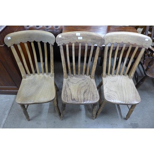 221 - A set of three Victorian beech and elm kitchen chairs