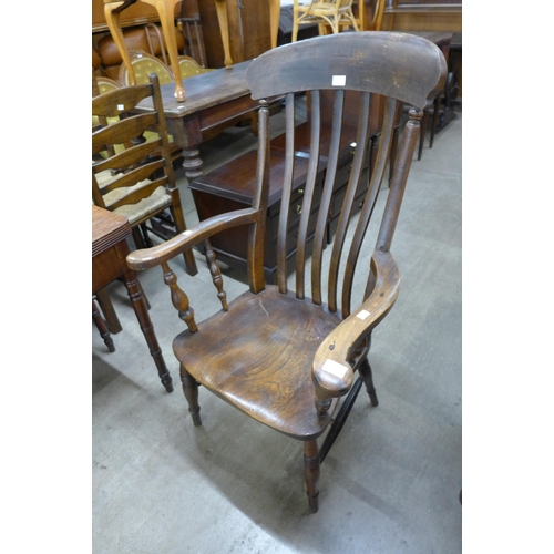 222 - A Victorian elm and beech farmhouse armchair