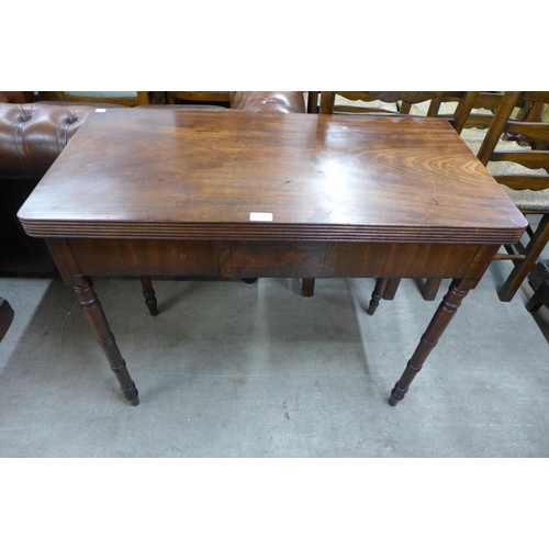 223 - A George IV mahogany rectangular fold over tea table