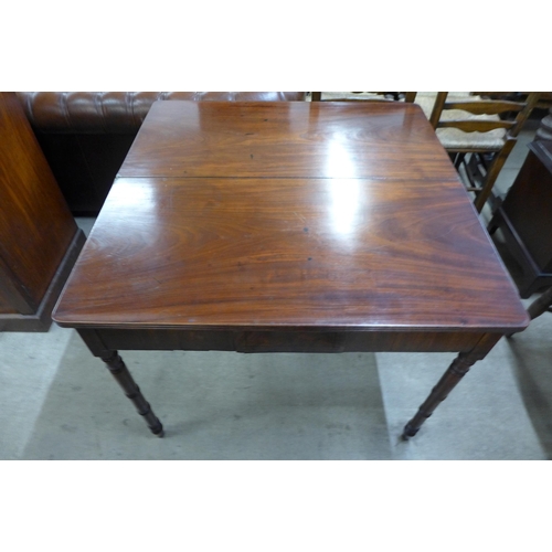 223 - A George IV mahogany rectangular fold over tea table