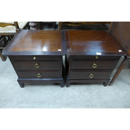 224 - A pair of Stag Minstrel mahogany bedside tables