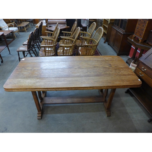 23 - An Arts and Crafts oak refectory table, 77cms h, 170cms l, 78cms w