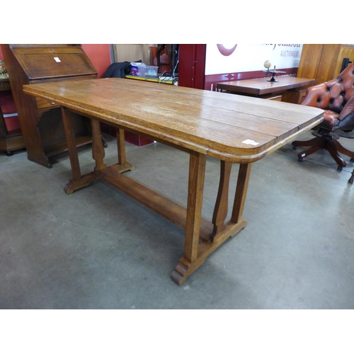 23 - An Arts and Crafts oak refectory table, 77cms h, 170cms l, 78cms w