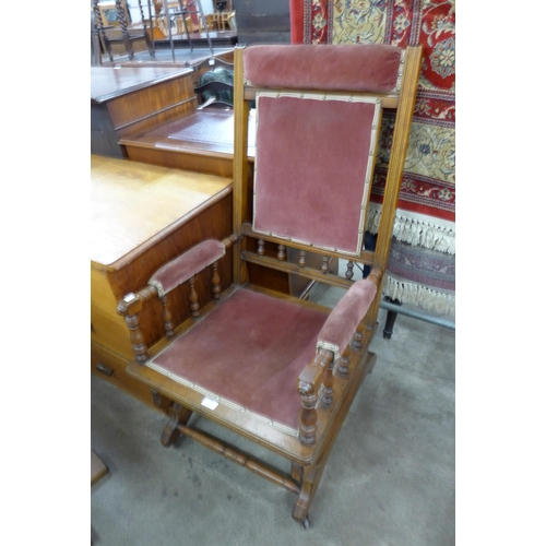 234 - An early 20th Century American beech rocking chair