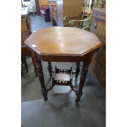 242 - A Victorian walnut octagonal occasional table