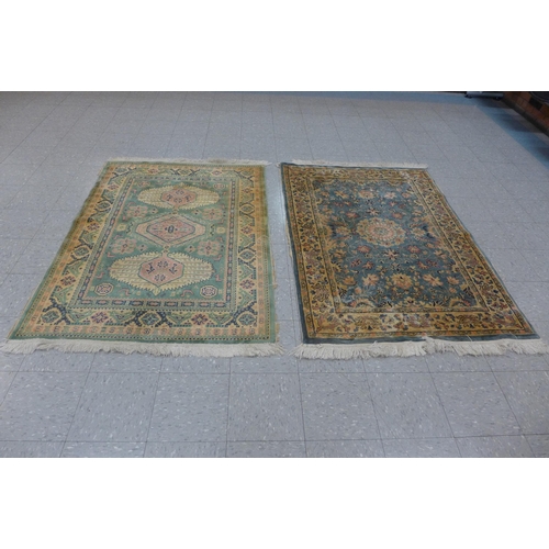 283 - Four assorted rugs, a/f