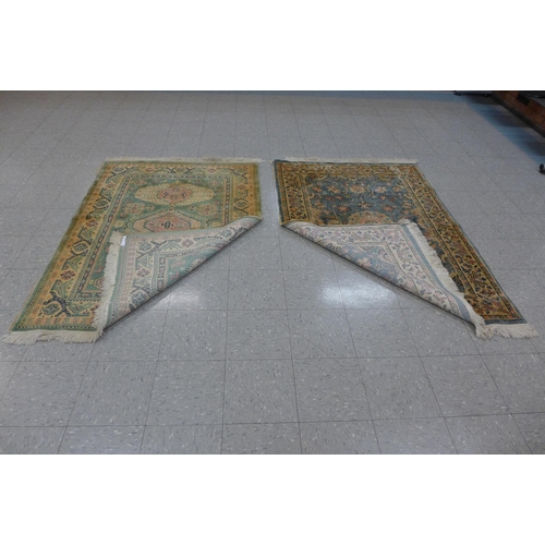 283 - Four assorted rugs, a/f