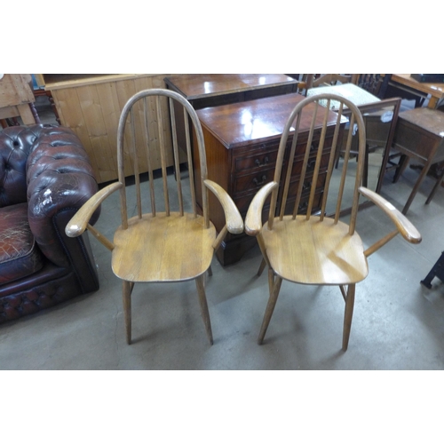 287 - A pair of Ercol style elm elbow chairs