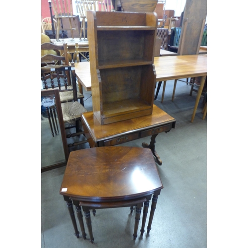 290 - A small oak bookcase, an oak open bookcase and a mahogany nest of tables