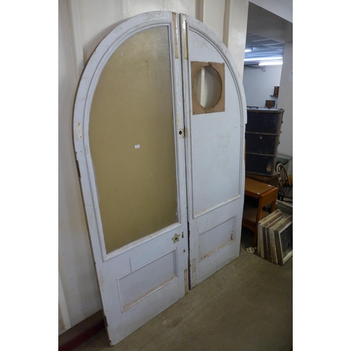 300 - A pair of large 19th Century painted arched doors, a/f