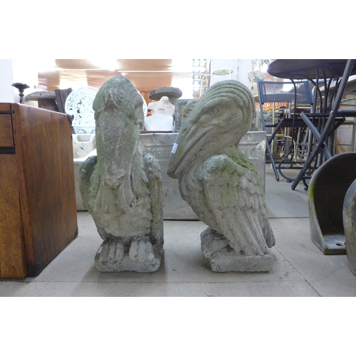 332 - A pair of mythical concrete garden figures