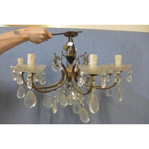 337 - An Italian metal and glass chandelier