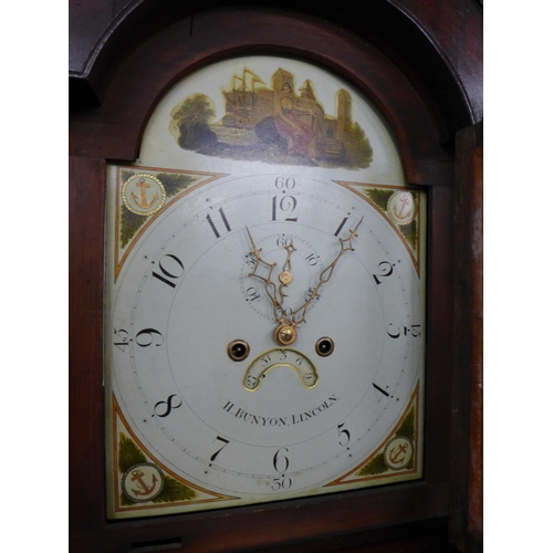 51 - A 19th Century oak 8-day longcase clock, the painted arched dial signed H. Bunyon, Lincoln