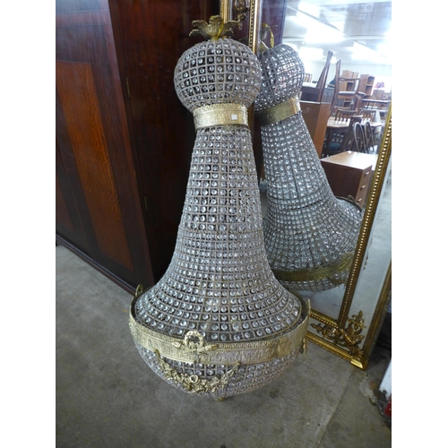 55 - A large French Empire style gilt metal and glass bag shaped chandelier