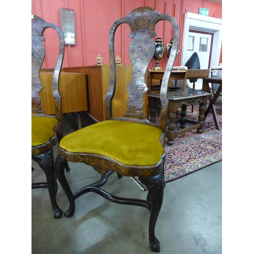 59 - A pair of 18th Century Dutch walnut and marquetry inlaid side chairs