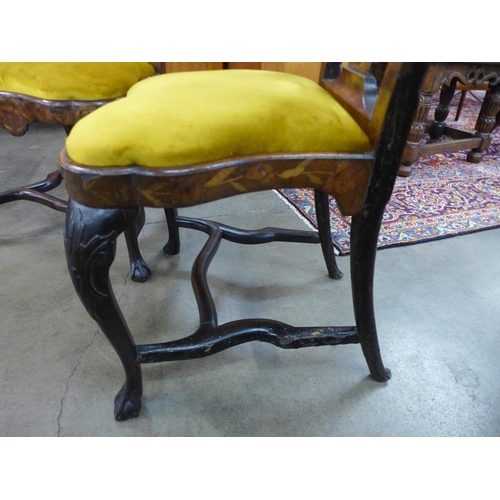 59 - A pair of 18th Century Dutch walnut and marquetry inlaid side chairs