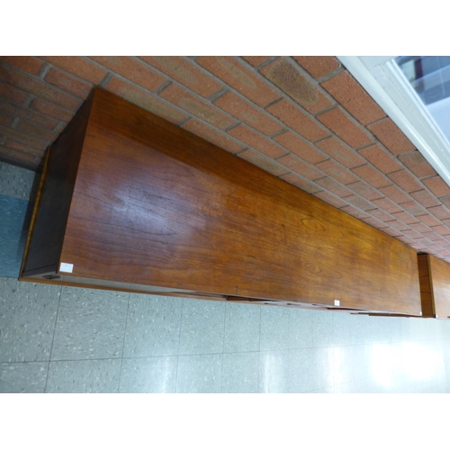 64 - A teak sideboard