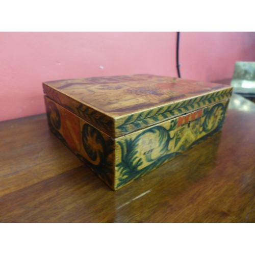 7 - A 19th Century box, hand painted with heraldic symbols