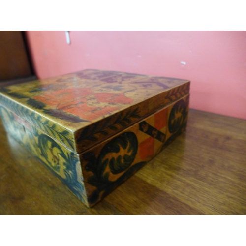 7 - A 19th Century box, hand painted with heraldic symbols