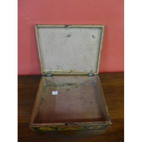 7 - A 19th Century box, hand painted with heraldic symbols