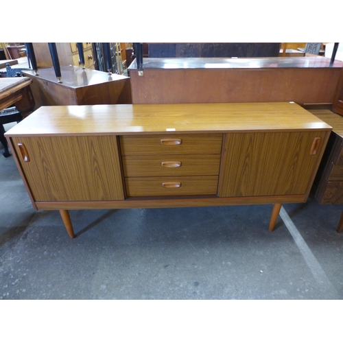 73 - A teak sideboard