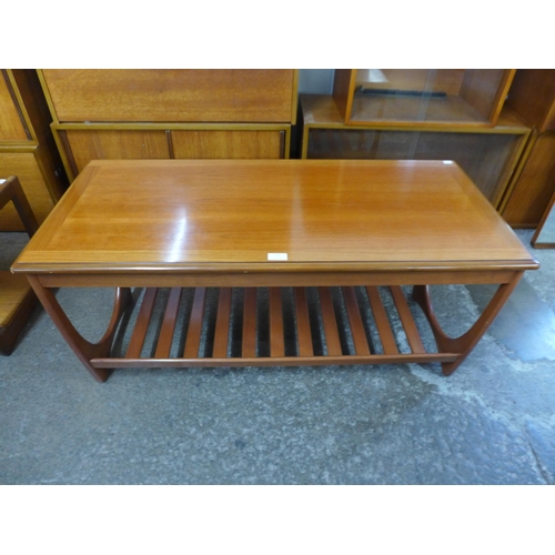 76 - A teak coffee table