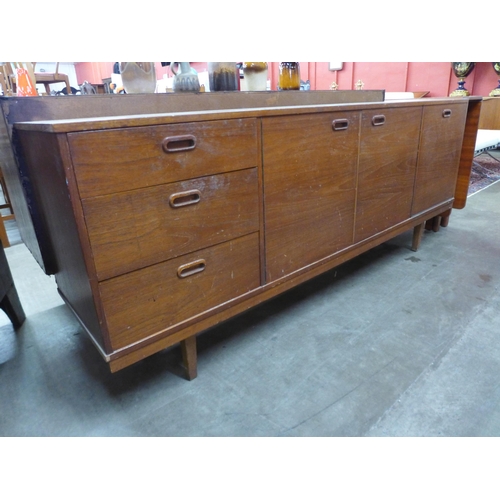 81 - A teak sideboard