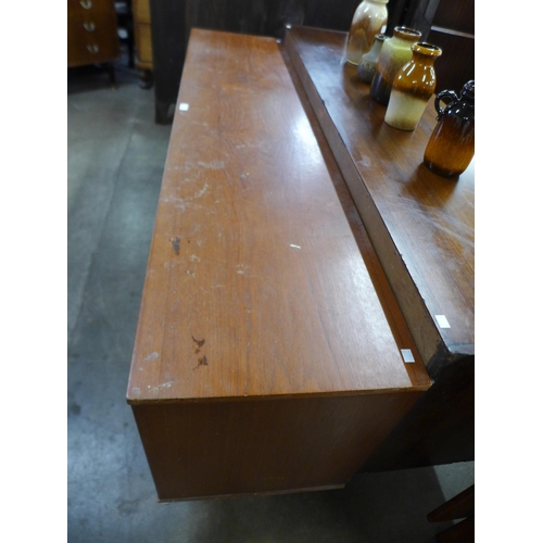 81 - A teak sideboard