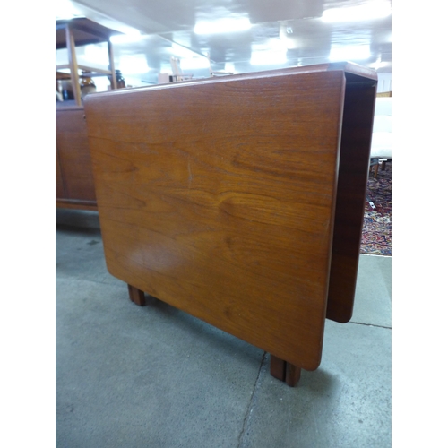 83 - A G-Plan teak drop-leaf table