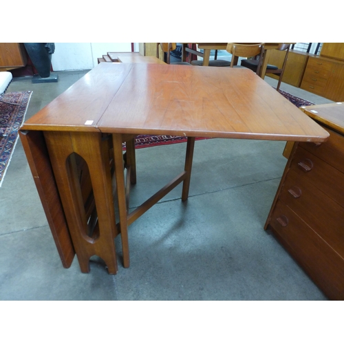 83 - A G-Plan teak drop-leaf table