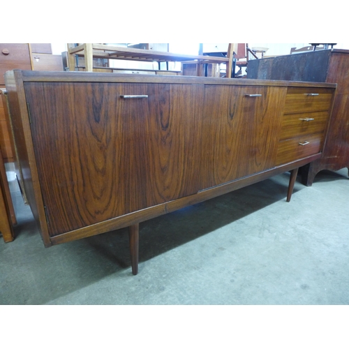 84 - A tola wood and afromosia sideboard